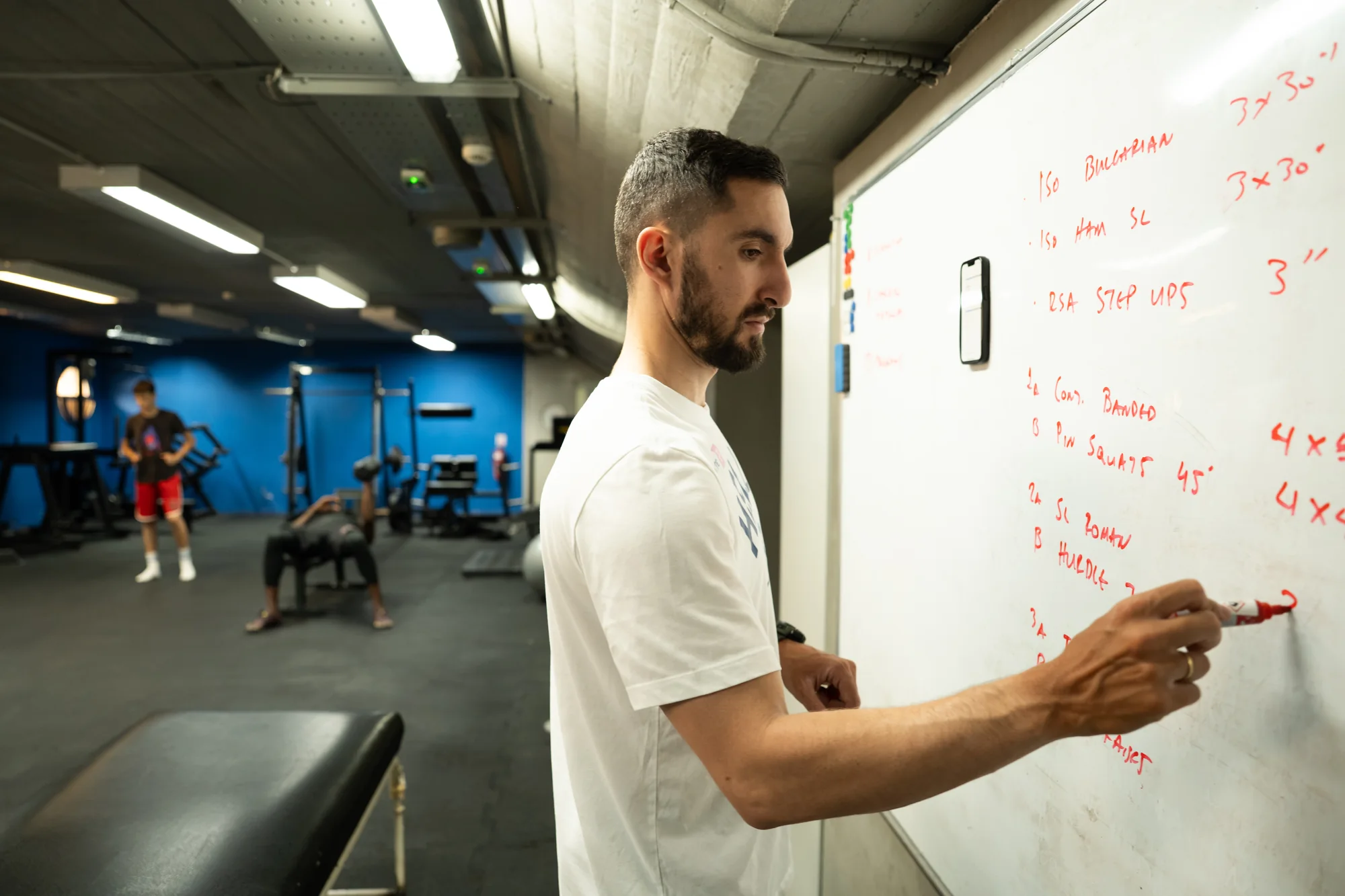 Georgios planning an individualized training session at the programming board